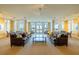 Relaxing community room with comfortable seating and large windows at 140 Riviera Dunes Way # 1001, Palmetto, FL 34221