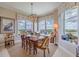 Sunlit dining area with stunning water views at 140 Riviera Dunes Way # 1001, Palmetto, FL 34221