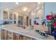 Gourmet kitchen with stainless steel appliances and island at 140 Riviera Dunes Way # 1001, Palmetto, FL 34221