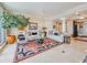 Comfortable living room with large windows and city view at 140 Riviera Dunes Way # 1001, Palmetto, FL 34221