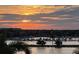 Beautiful sunset over marina and waterfront at 140 Riviera Dunes Way # 1001, Palmetto, FL 34221