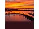 Spectacular sunset over calm waters and marina at 140 Riviera Dunes Way # 1001, Palmetto, FL 34221