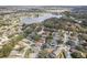 Aerial view of homes and lakefront community at 3022 Beaver Pond Trl, Valrico, FL 33596