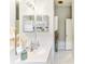 Bright bathroom with double vanity and modern fixtures at 3022 Beaver Pond Trl, Valrico, FL 33596