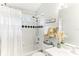 Clean bathroom with shower/tub combo and updated vanity at 3022 Beaver Pond Trl, Valrico, FL 33596