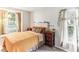 Cozy bedroom with window seat and neutral-toned bedding at 3022 Beaver Pond Trl, Valrico, FL 33596