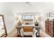 Spacious bedroom with large window and neutral decor at 3022 Beaver Pond Trl, Valrico, FL 33596