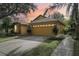 Two-car garage and charming curb appeal at 3022 Beaver Pond Trl, Valrico, FL 33596