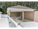 Covered seating area near the pool at 3022 Beaver Pond Trl, Valrico, FL 33596