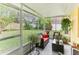 Spacious screened porch overlooking the backyard at 3022 Beaver Pond Trl, Valrico, FL 33596