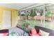 Bright screened porch with access to backyard at 3022 Beaver Pond Trl, Valrico, FL 33596