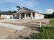 Charming single-story home with three-car garage and a well-manicured lawn at 413 Shannon Estates Ct, Plant City, FL 33563