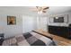 Spacious bedroom with a double bed, dresser, and closet at 4304 Woodfield Ave, Holiday, FL 34691