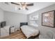 Simple bedroom with twin bed and window at 4304 Woodfield Ave, Holiday, FL 34691