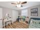 Well-lit bedroom with twin bed, desk and closet at 4304 Woodfield Ave, Holiday, FL 34691
