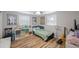 Charming bedroom with twin bed, and ample storage at 4304 Woodfield Ave, Holiday, FL 34691
