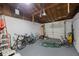 Garage with bikes, and additional storage space at 4304 Woodfield Ave, Holiday, FL 34691