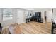 Light and airy living room with hardwood floors and modern decor at 4304 Woodfield Ave, Holiday, FL 34691