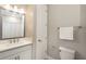 Clean bathroom with white vanity and shower at 4663 Almada Ln, Wesley Chapel, FL 33543