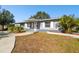 Ranch-style home with a covered entryway and walkway at 5239 22Nd N Ave, St Petersburg, FL 33710