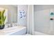 Clean bathroom with a single sink, tub, and shower at 5803 Laurelcrest Gln, Palmetto, FL 34221