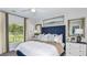 Spacious bedroom with a comfortable bed, ample natural light, and plenty of closet space at 5803 Laurelcrest Gln, Palmetto, FL 34221