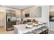 Modern kitchen with stainless steel appliances and an island at 5803 Laurelcrest Gln, Palmetto, FL 34221