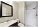 Clean bathroom with a shower/tub combo and vanity at 7403 S Swoope St, Tampa, FL 33616