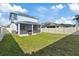 Spacious backyard with a view of the house at 7501 Northern Lights Dr, Gibsonton, FL 33534