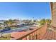 Balcony view overlooking waterfront homes and lush greenery at 8050 Brighton Dr, Port Richey, FL 34668