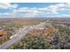 Aerial view of property showing roads and surrounding landscape at 8933 Crescent Forest Blvd, New Port Richey, FL 34654