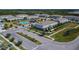 Aerial view of townhouses, pool, and community features at 9655 Pembrooke Pines Dr, Sun City Center, FL 33573