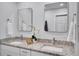 Modern bathroom with double vanity and granite countertops at 107 17Th St, Belleair Beach, FL 33786