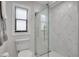 Updated bathroom featuring a large marble shower at 107 17Th St, Belleair Beach, FL 33786