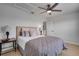 Comfortable bedroom with ceiling fan and light decor at 107 17Th St, Belleair Beach, FL 33786