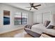 Spacious bedroom with ceiling fan and large window at 107 17Th St, Belleair Beach, FL 33786