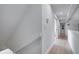 Clean and bright upstairs hallway with light wood floors at 107 17Th St, Belleair Beach, FL 33786