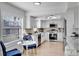 Modern kitchen with stainless steel appliances and granite countertops at 107 17Th St, Belleair Beach, FL 33786