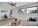 Multi-purpose room with glass desk and comfortable seating at 107 17Th St, Belleair Beach, FL 33786