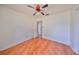 Simple bedroom with tile flooring and a ceiling fan at 11 Leaning Palm Ct, Plant City, FL 33563