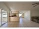Bright kitchen features a breakfast bar and access to the backyard at 11 Leaning Palm Ct, Plant City, FL 33563