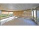 Spacious screened porch with tiled flooring at 11 Leaning Palm Ct, Plant City, FL 33563