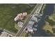 Aerial view of waterfront condo community with pool and boat slips at 12055 Gandy N Blvd # 231, St Petersburg, FL 33702