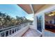 Spacious balcony offering wooded views and access to bedroom at 12055 Gandy N Blvd # 231, St Petersburg, FL 33702