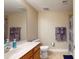 Clean bathroom with a toilet, shower, and vanity at 12055 Gandy N Blvd # 231, St Petersburg, FL 33702