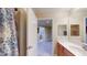 Bright bathroom with double vanity and shower/tub combo at 12055 Gandy N Blvd # 231, St Petersburg, FL 33702