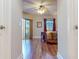 Bedroom with wood floors and access to balcony at 12055 Gandy N Blvd # 231, St Petersburg, FL 33702