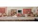 Community room with comfortable seating and a view of the gym at 12055 Gandy N Blvd # 231, St Petersburg, FL 33702