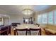 Elegant dining room with marble table and view of kitchen at 12055 Gandy N Blvd # 231, St Petersburg, FL 33702