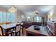 Bright dining room with large windows and chandelier at 12055 Gandy N Blvd # 231, St Petersburg, FL 33702